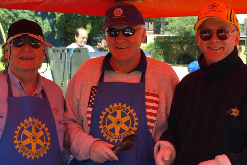 Rotarians serving