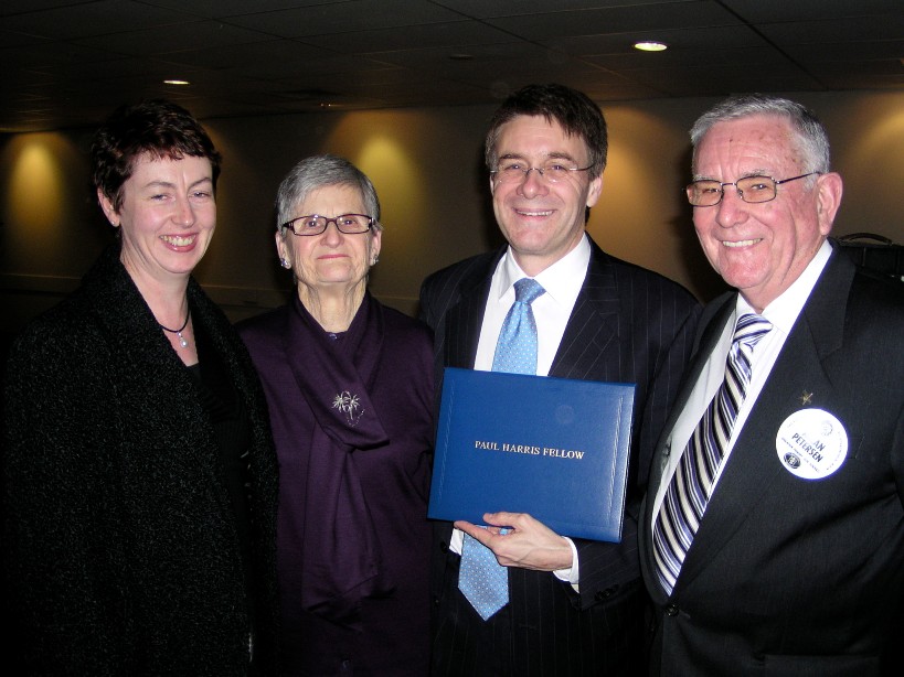Andrew with his Paul Harris Fellow award and his wife, his mother Welwyn and his father PP Allan