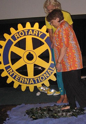 Stella Camenzuli of Holroyd walking on the broken glass